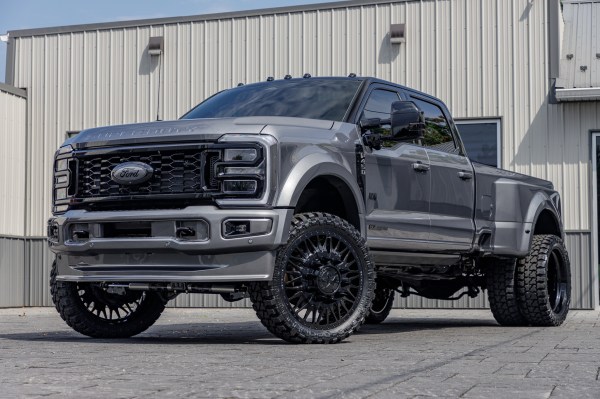 2024 Ford F-450 Super Duty with a 4" Wicked lift kit, 26x8.25 American Force Plague wheels, and Fury Country Hunter M/T tires.