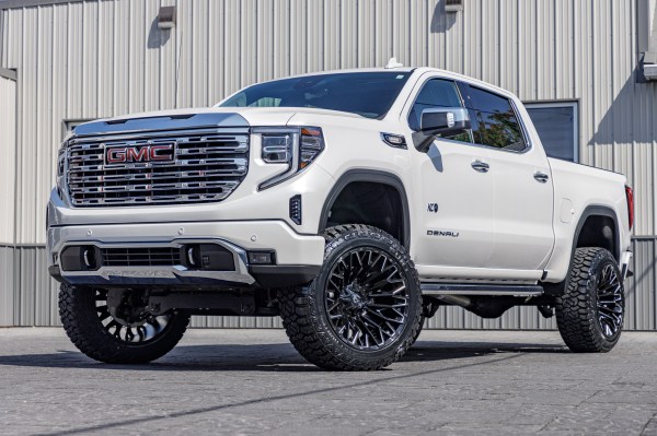 2023 GMC Sierra 1500 Denali with a 6" Rough Country suspension kit, 22x12 Fuel Strike wheels, and 35" Fury Country Hunter R/T tires.