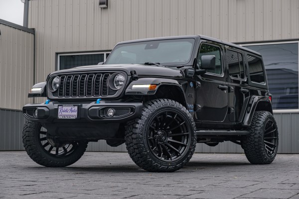 2024 Jeep Wrangler Unlimited Sahara 4XE with a 2.5" Rough Country lift kit, 22x12 Fuel Burn wheels, and 35" Fury Country Hunter R/T tires.