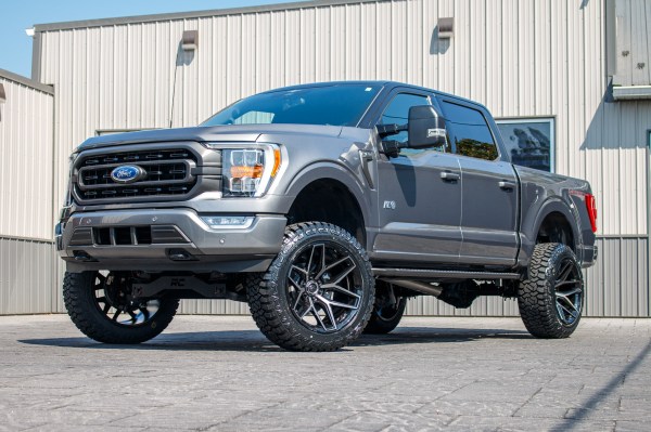 2023 Ford F-150 XLT with a 6" Rough Country lift kit, 22x12 Fuel Flux wheels, and 35" Fury Country Hunter R/T tires.