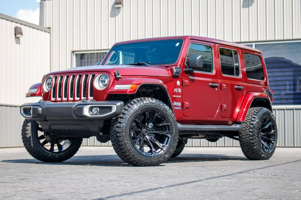 2021 Jeep Wrangler Unlimited Sahara 4XE, 22x12 Fuel Flame wheels, and 35" Fury Country Hunter R/T tires.