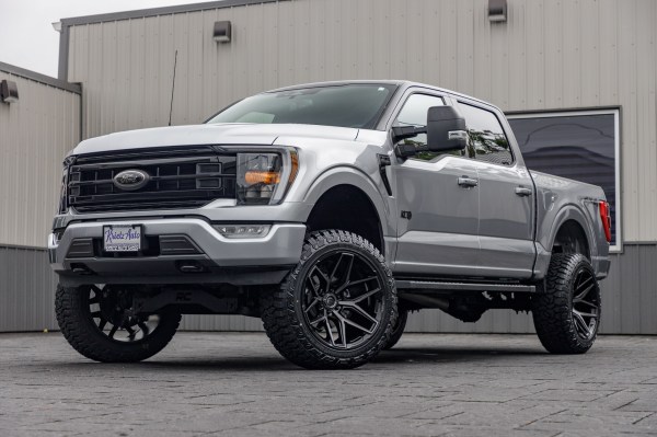 2022 Ford F-150 XLT with a 6" Rough Country lift kit, 22x12 Fuel Flux wheels, and 35" Fury Country Hunter R/T tires.