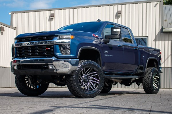 2023 Chevrolet Silverado 3500 LT with a 5" BDS lift kit, 22x12 Fuel Typhoon wheels, and 35" Nitto Ridge Grappler tires.