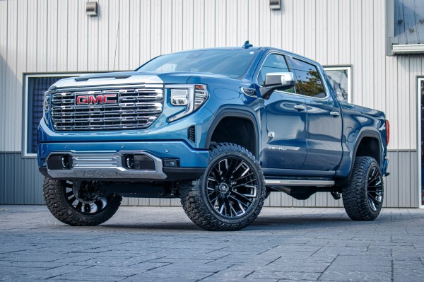 2024 GMC Sierra 1500 Denali with a 6" Rough Country lift kit, 22x12 Fuel Rebar wheels, and 35" Fury Country Hunter R/T tires.