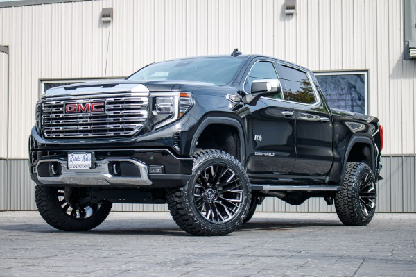 2022 GMC Sierra 1500 Denali with a 6" Rough Country suspension kit, 22x12 Fuel Rebar wheels, and 35" Fury Country Hunter R/T tires.
