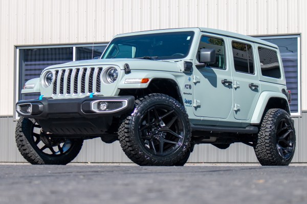 2023 Jeep Wrangler Unlimited Sahara 4XE with a 2.5" Rough Country lift kit, 22x12 Fuel Flux wheels, and 35" Fury Country Hunter R/T tires.