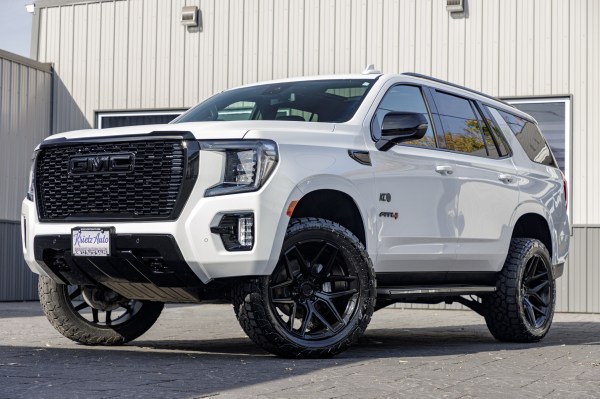 2023 GMC Yukon AT4 with a 3" ReadyLift lift kit, 22x10 Fuel Flux wheels, and 295/50 Toyo Open Country AT3 tires.