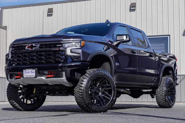 2022 Chevrolet Silverado 1500 ZR2 with a 4" ReadyLift lift kit, 22x12 TIS 554B wheels, and 35" Fury Country Hunter R/T tires.