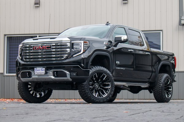 2024 GMC Sierra 1500 Denali with a 6" Rough Country suspension kit, 22x12 Fuel Rebar wheels, and 35" Fury Country Hunter R/T tires.
