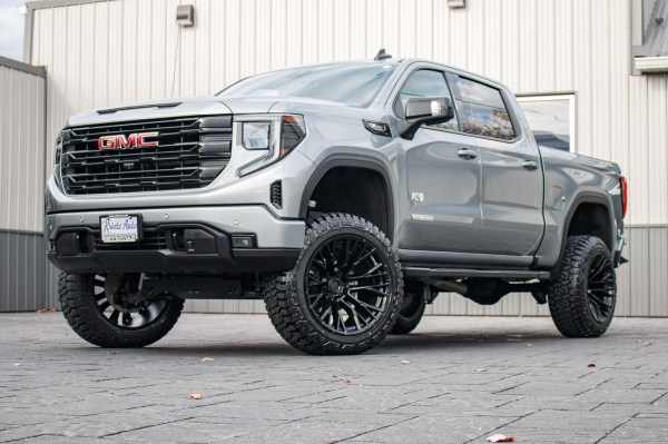 2024 GMC Sierra 1500 Elevation with a 6" Rough Country lift kit, 22x12 Fuel Rebar wheels, and 35" Fury Country Hunter R/T tires.
