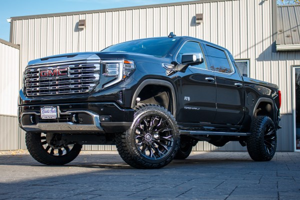 2024 GMC Sierra 1500 Denali with a 6" Rough Country suspension kit, 22x12 Fuel Flame wheels, and 35" Fury Country Hunter R/T tires.