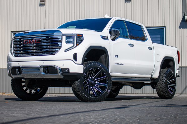 2023 GMC Sierra 1500 Denali with a 6" Rough Country suspension kit, 22x12 Fuel Contra wheels, and 35" Fury Country Hunter R/T tires.