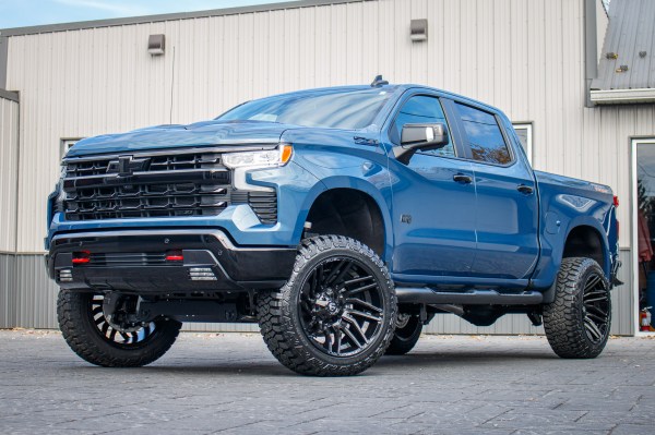 2024 Chevrolet Silverado 1500 LT Trail Boss with a 6" Rough Country lift kit, 22x12 Fuel Typhoon wheels, and 35" Fury Country Hunter R/T tires.
