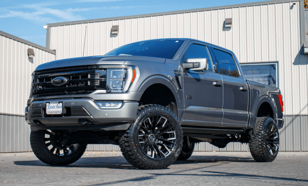 2022 Ford F-150 Lariat with a 6" Rough Country lift kit, 22x12 Fuel Rebar wheels, and 35" Fury Country Hunter R/T tires.