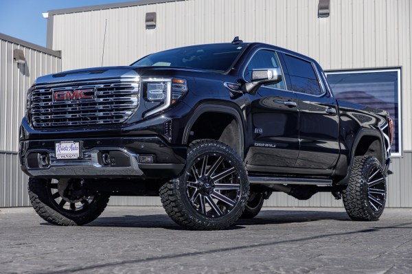 2023 GMC Sierra 1500 Denali with a 6" Rough Country suspension kit, 22x12 Fuel Contra wheels, and 35" Fury Country Hunter R/T tires.