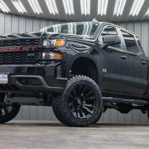 2021 Chevrolet Silverado 1500 Custom with a 6" Rough Country lift kit, 22x12 Fuel Blitz wheels, and 35" Fury Country Hunter R/T tires.