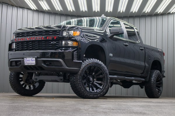 2021 Chevrolet Silverado 1500 Custom with a 6" Rough Country lift kit, 22x12 Fuel Blitz wheels, and 35" Fury Country Hunter R/T tires.