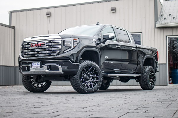 2023 GMC Sierra 1500 Denali with a 6" Rough Country suspension kit, 22x12 Fuel Twitch wheels, and 35" Fury Country Hunter R/T tires.
