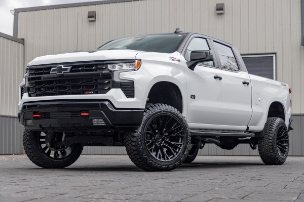 2024 Chevrolet Silverado 1500 LT Trail Boss with a 6" Rough Country lift kit, 22x12 Fuel Rebar wheels, and 35" Fury Country Hunter R/T tires.