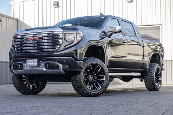 2022 GMC Sierra 1500 Denali with a 6" Rough Country suspension kit, 22x12 Fuel Rebar wheels, and 35" Fury Country Hunter R/T tires.