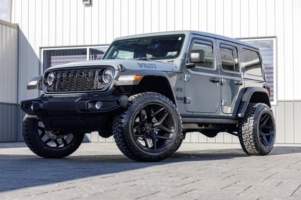 2024 Jeep Wrangler Sport with a 2.5" Rough Country lift kit, 22x12 Fuel Flux wheels, and 35" Fury Country Hunter R/T tires.