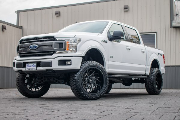 2020 Ford F-150 XLT with a 6" Rough Country lift kit, 22x12 Fuel Runner wheels, and 35" Fury Country Hunter R/T tires.