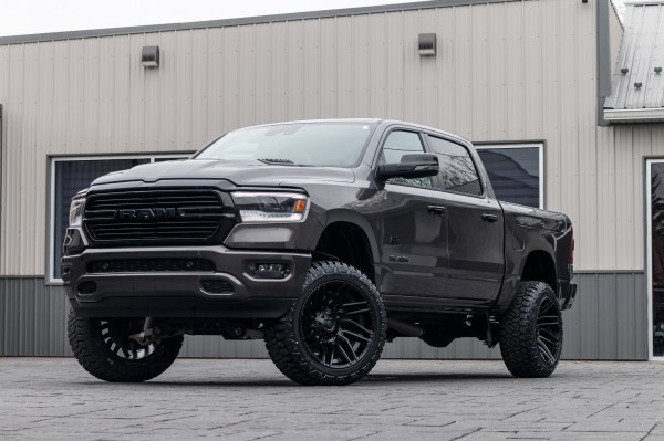2024 Ram 1500 Laramie with a 6" Rough Country lift kit, 22x12 Fuel Typhoon wheels, and 35" Fury Country Hunter R/T tires.