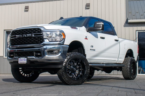 2024 Ram 2500 Big Horn with a 4.5" ReadyLift lift kit, 22x12 Fuel Arc wheels, and 35" Nitto Ridge Grappler tires.