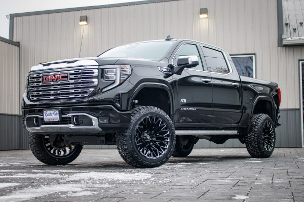 2024 GMC Sierra 1500 Denali with a 6" Rough Country lift kit, 22x12 Fuel Strike wheels, and 35" Fury Country Hunter R/T tires.