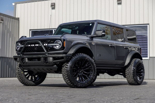 2023 Ford Bronco Wildtrak with a 2.25" Zone lift kit, 22x12 Fuel Rebar wheels, and 35" Fury Country Hunter R/T tires.