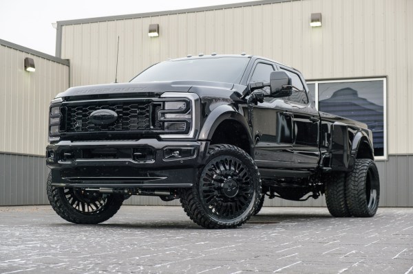 2025 Ford F-450 Platinum with a 4" Wicked lift kit, 26x8.25 American Force Brawn wheels, and 37" AMP Terrain Attack M/T A tires.