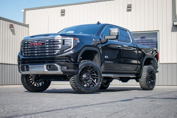 2024 GMC Sierra 1500 Denali with a 6" Rough Country suspension kit, 22x12 Fuel Typhoon wheels, and 35" Fury Country Hunter R/T tires.