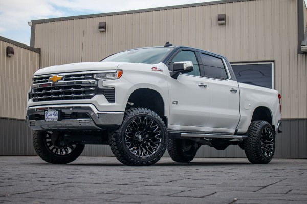 2023 Chevrolet Silverado 1500 LTZ with a 6" Rough Country lift kit, 22x12 Fuel Strike wheels, and 35" Fury Country Hunter R/T tires.