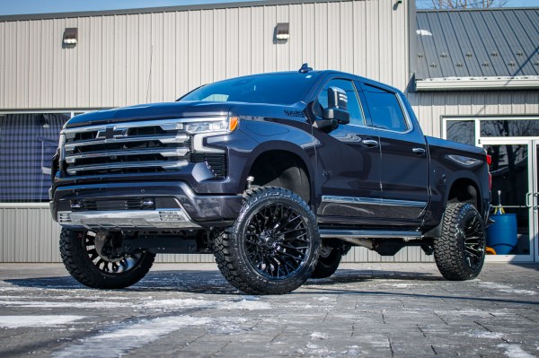 2024 Ram 2500 Big Horn with a 5" Rough Country lift kit, 22x12 Fuel Brawl wheels, and 37" Nitto Ridge Grappler tires.