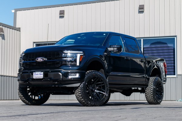 2024 Ford F-150 Platinum with a 6" Rough Country lift kit, 22x12 TIS 554B wheels, and 35" Fury Country Hunter R/T tires.