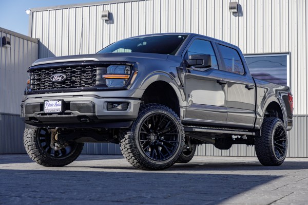 2024 Ford F-150 STX with a 6" Rough Country lift kit, 22x12 Fuel Rebar wheels, and 35" Fury Country Hunter R/T tires.