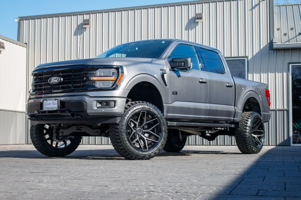 2024 Ford F-150 XLT with a 6" Rough Country lift kit, 22x12 Fuel Flux wheels, and 35" Fury Country Hunter R/T tires.
