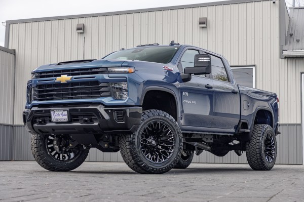 2025 Chevrolet Silverado 2500 Custom with a 5" BDS lift kit, 22x12 Fuel Strike wheels, and 37" Nitto Ridge Grappler tires.