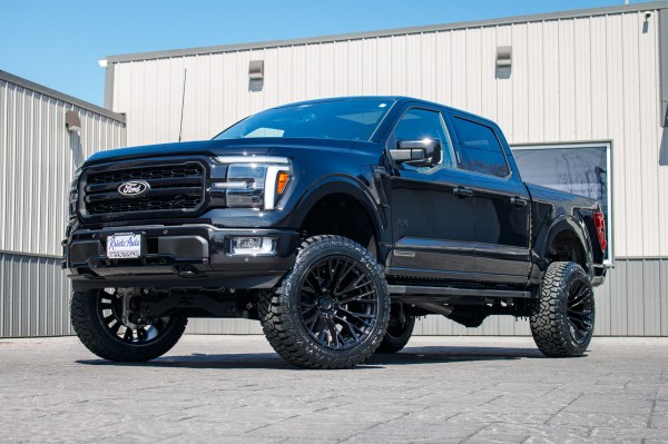 2024 Ford F-150 Lariat with a 6" Rough Country lift kit, 22x12 Fuel Rebar wheels, and 35" Fury Country Hunter R/T tires.