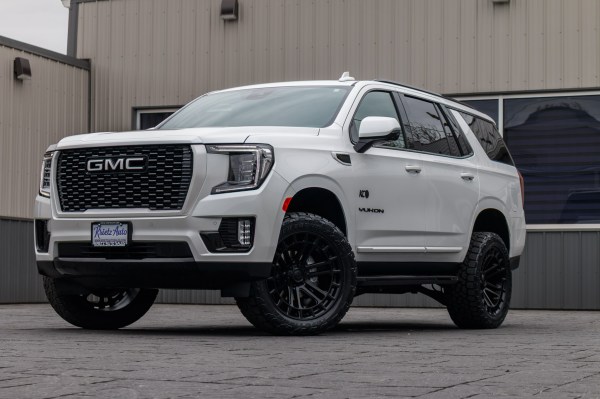 2023 GMC Yukon SLT with a 3" ReadyLift lift kit, 22x10 Fuel Heater wheels, and 295/50 Toyo Open Country A/T III tires.