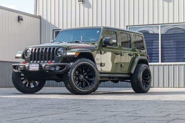 2021 Jeep Wrangler with Jeep Stock suspension, 22x12 Fuel Rebar wheels, and 35" Fury Country Hunter R/T tires.