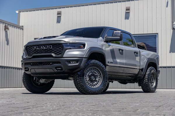2025 Ram 1500 RHO with a 2.5" Eibach lift kit, 20x9.5 Black Rhino Armory wheels, and 37" Nitto Ridge Grappler tires.