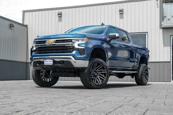 2024 Chevrolet Silverado 1500 LT with a 6" Rough Country lift kit, 22x12 Fuel Typhoon wheels, and 3%" Fury Country Hunter R/T tires.