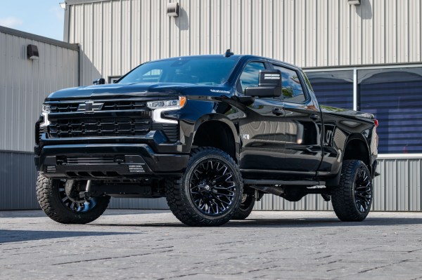 2024 Chevrolet Silverado 1500 RST with a 6" Rough Country lift kit, 22x12 Fuel Strike wheels, and 35" Fury Country Hunter R/T tires.