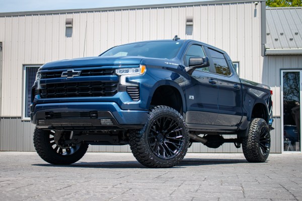 2023 Chevrolet Silverado 1500 RST with a 6" Rough Country lift kit, 22x12 Fuel Rebar wheels, and 35" Fury Country Hunter R/T tires.