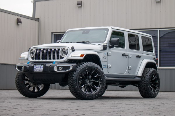 2024 Jeep Wrangler Unlimited Sahara 4XE with a 2.5" Rough Country lift kit, 22x12 Fuel Flame wheels, and 35" Fury Country Hunter R/T tires.
