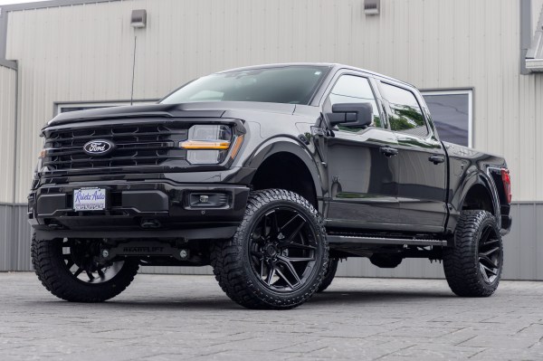 2024 Ford F-150 XLT with a 6" ReadyLift lift kit, 22x12 Fuel Flux wheels, and 35" Avix Trailtek tires.