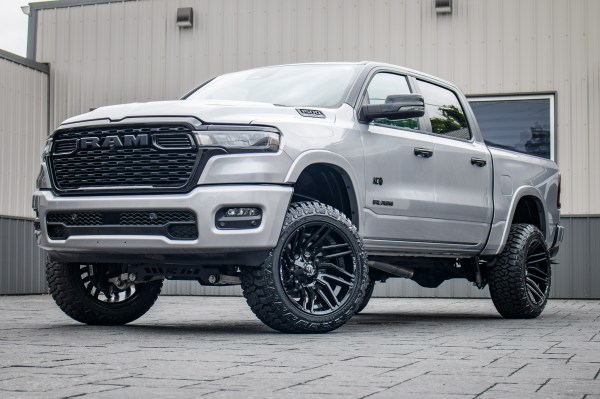 2025 Ram 1500 Lone Star with a 6" Rough Country lift kit, 22x12 Fuel Typhoon wheels, and 35" Fury Country Hunter R/T tires.
