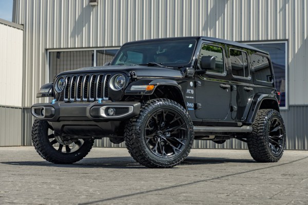 2023 Jeep Wrangler Unlimited Sahara 4XE with a 2.5" Rough Country lift kit, 22x12 Fuel Flame wheels, and 35" Avix Trailtek R/T tires.