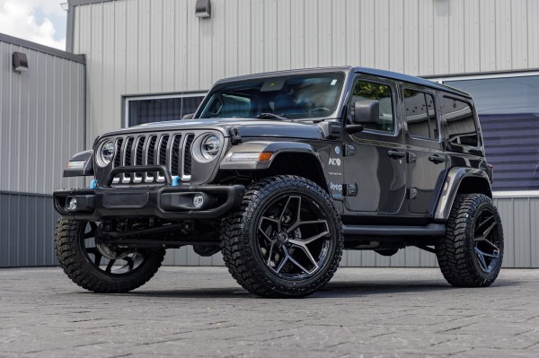 2022 Jeep Wrangler Unlimited Sahara 4XE with a 2.5" Rough Country lift kit, 22x12 Fuel Flux wheels, and 35" Avix Trailtek R/T tires.